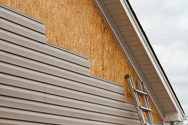 Professional Emergency Siding Repair technician working in Richfield, PA